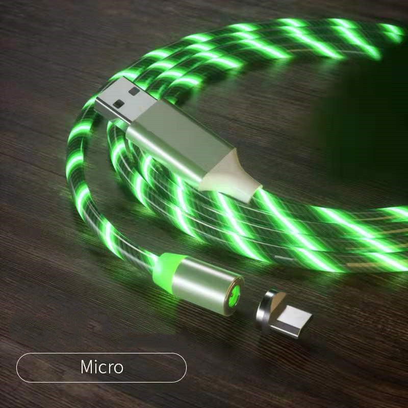 USB cable with green LED lights on a wooden surface