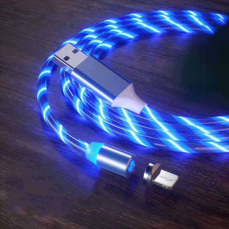 USB cable with blue LED lights on a wooden surface