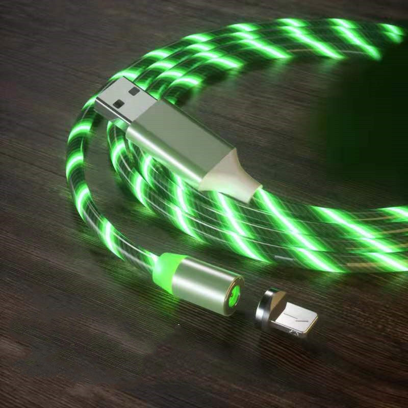 Green LED USB cable on a wooden surface