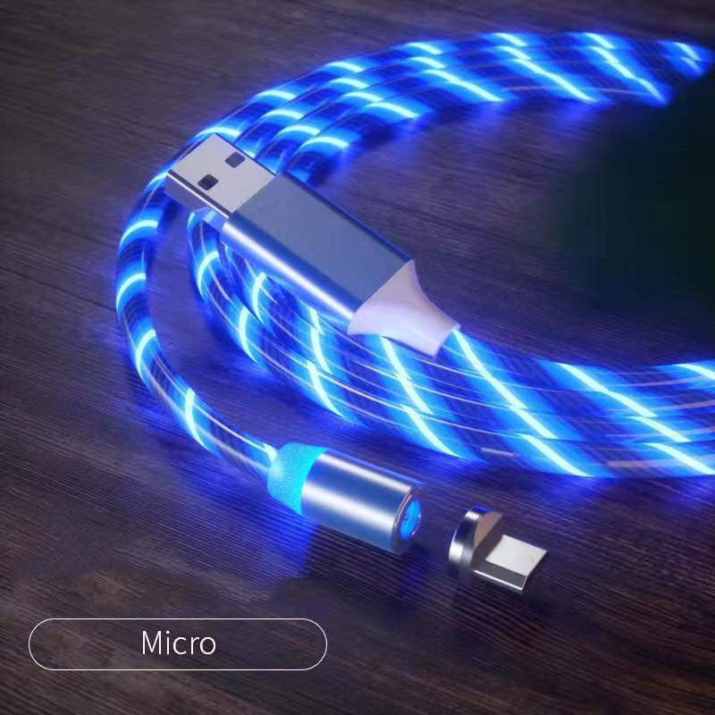 USB cable with blue LED lights on a wooden surface