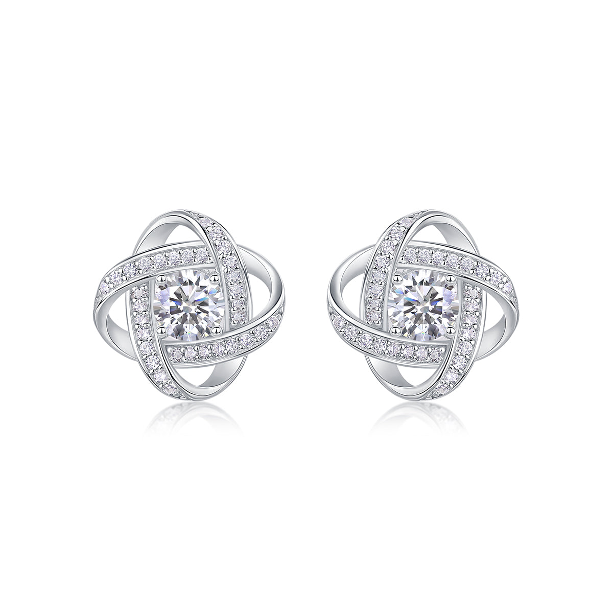 Pair of silver earrings with interlocking design and clear gemstones on a white background