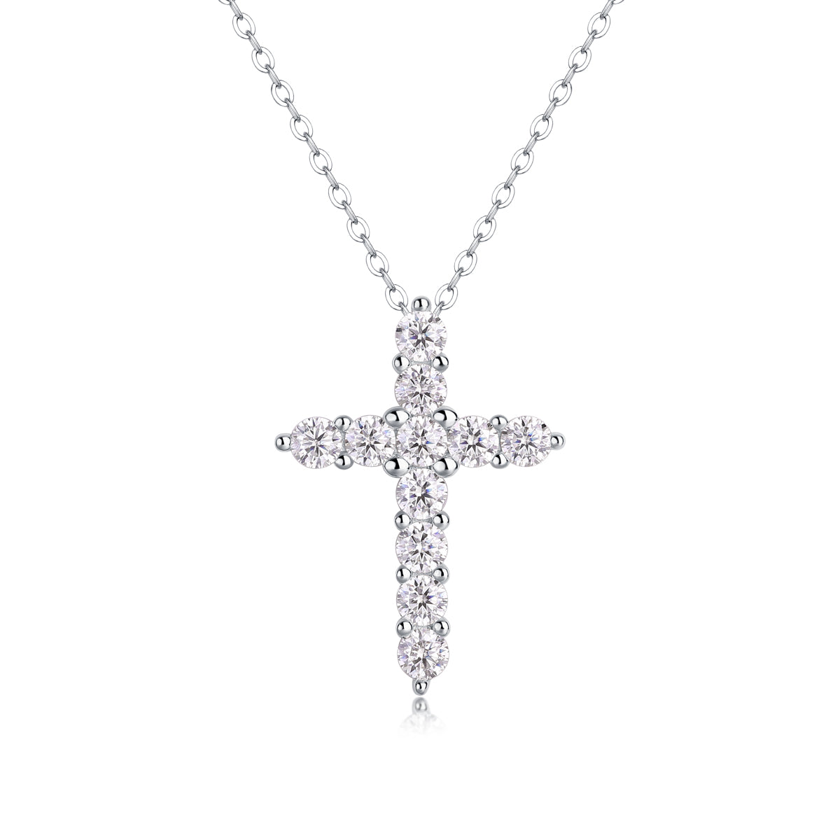 Silver cross pendant necklace on a white background