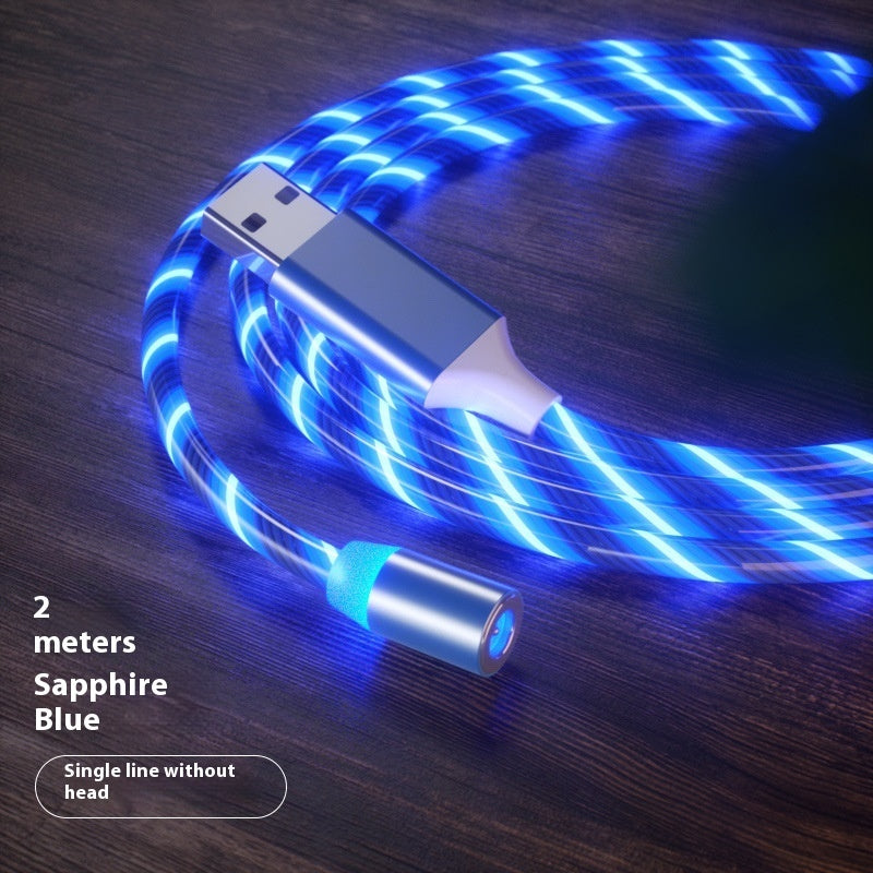 Sapphire blue LED USB cable on a wooden surface